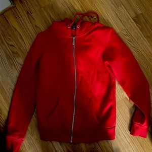 red zip up